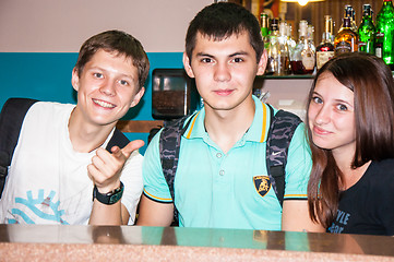 Image showing The young man behind the bar