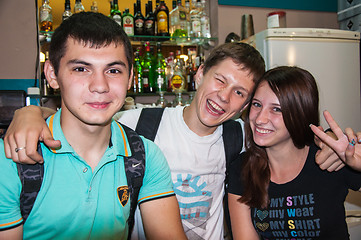 Image showing The young man behind the bar