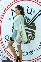 Image showing The girl in the Orenburg downy shawl,