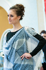 Image showing The girl in the Orenburg downy shawl,