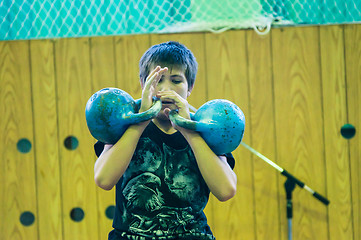 Image showing The boy in the kettlebell sport