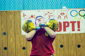 Image showing The boy in the kettlebell sport