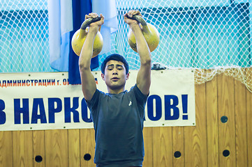 Image showing The boy in the kettlebell sport