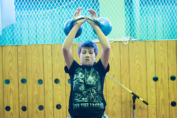 Image showing The boy in the kettlebell sport