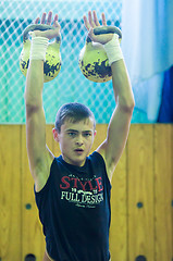 Image showing The boy in the kettlebell sport