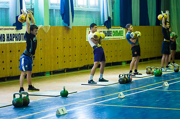 Image showing The boy in the kettlebell sport