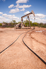 Image showing Texas Oil Pump Jack Fracking Crude Extraction Machine