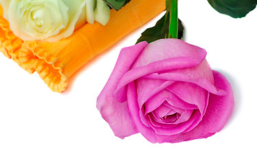 Image showing Bouquet of roses in a beautiful package on a white background.