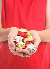 Image showing Handful of chocolates