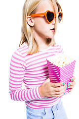 Image showing Girl eating pop corn