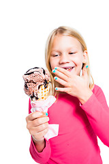 Image showing Girl holding chocolate ice cream