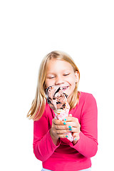 Image showing Girl holding chocolate ice cream