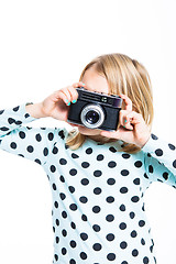 Image showing Girl with an old camera