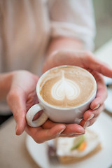 Image showing Cup of delicious coffee with a heart