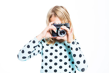 Image showing Girl with an old camera