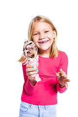 Image showing Girl holding chocolate ice cream