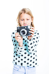 Image showing Girl with an old camera