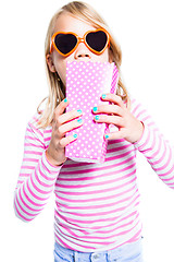 Image showing Girl eating pop corn