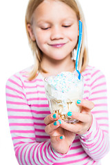 Image showing Girl holding ice cream dessert