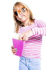 Image showing Girl eating pop corn