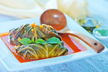 Image showing dolma with tomato sauce