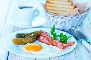 Image showing fried egg with bacon 