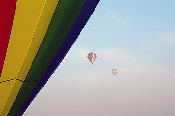 Image showing hot air balloons in the morning fog