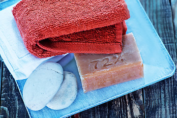 Image showing soap, stones and towels 