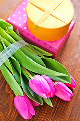 Image showing present and tulips