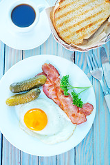 Image showing fried egg with bacon 