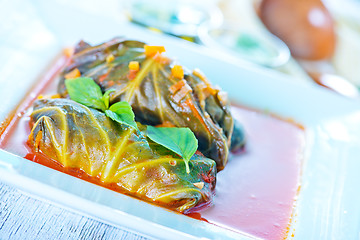 Image showing dolma with tomato sauce