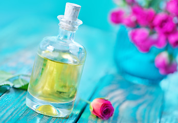Image showing rose oil in glass bottle