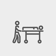 Image showing Man pushing the stretcher with sick person thin line icon