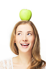 Image showing apple on her head