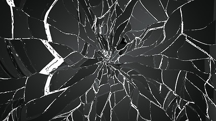 Image showing Pieces of splitted or cracked glass isolated on white