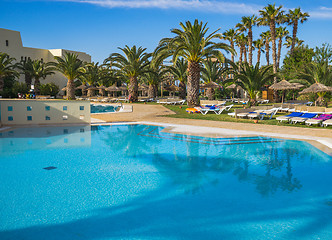 Image showing Large Swimming pool and trees at resort