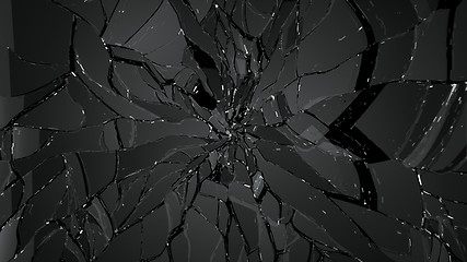 Image showing Splitted or cracked glass on black