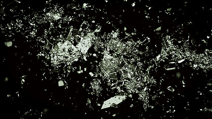 Image showing Pieces of shattered or cracked glass on black