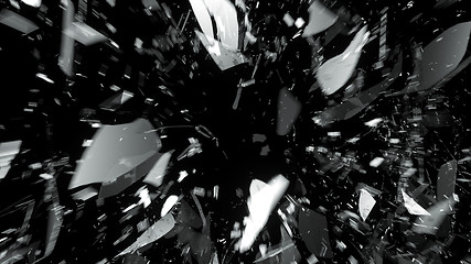 Image showing Pieces of broken glass on black with motion blur