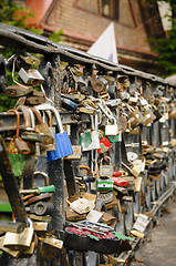 Image showing Locks on a bridge railing