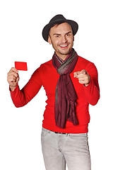 Image showing Smiling casual man showing blank credit card