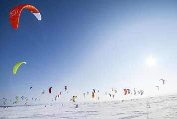 Image showing Kiteboarder with kite on the snow