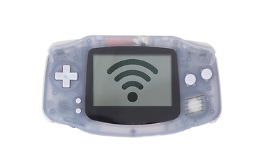 Image showing Old dirty portable game console with a small screen