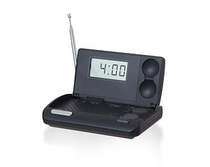 Image showing Old digital radio alarm clock isolated on white