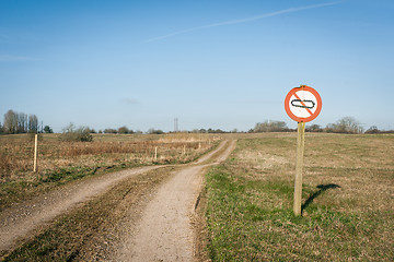 Image showing Restricted area sign with a tank