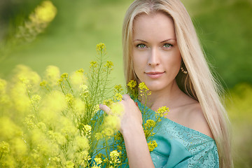 Image showing Beautiful woman over nature background