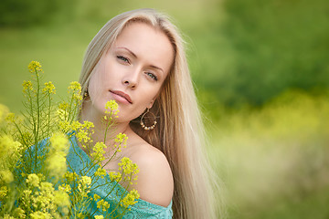 Image showing Beautiful woman over nature background