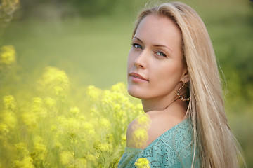 Image showing Beautiful woman over nature background