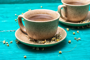 Image showing tea brewed with chamomile in ceramic mugs