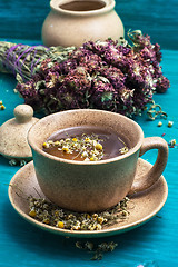 Image showing tea brewed with chamomile in ceramic mugs
